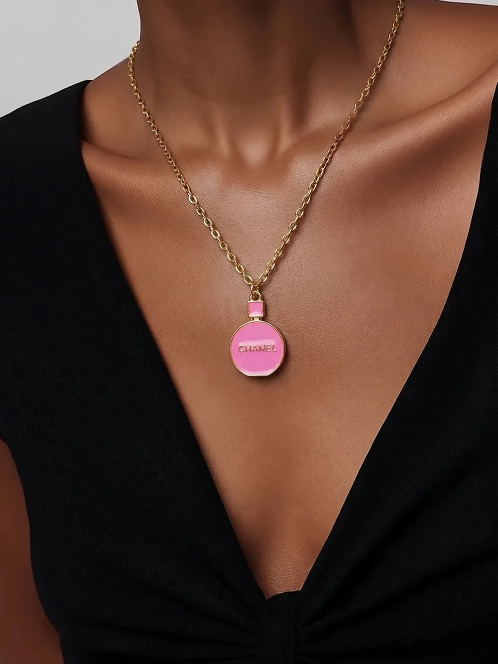 Gold-Tone Necklace with Pink Enamel Round Pendant